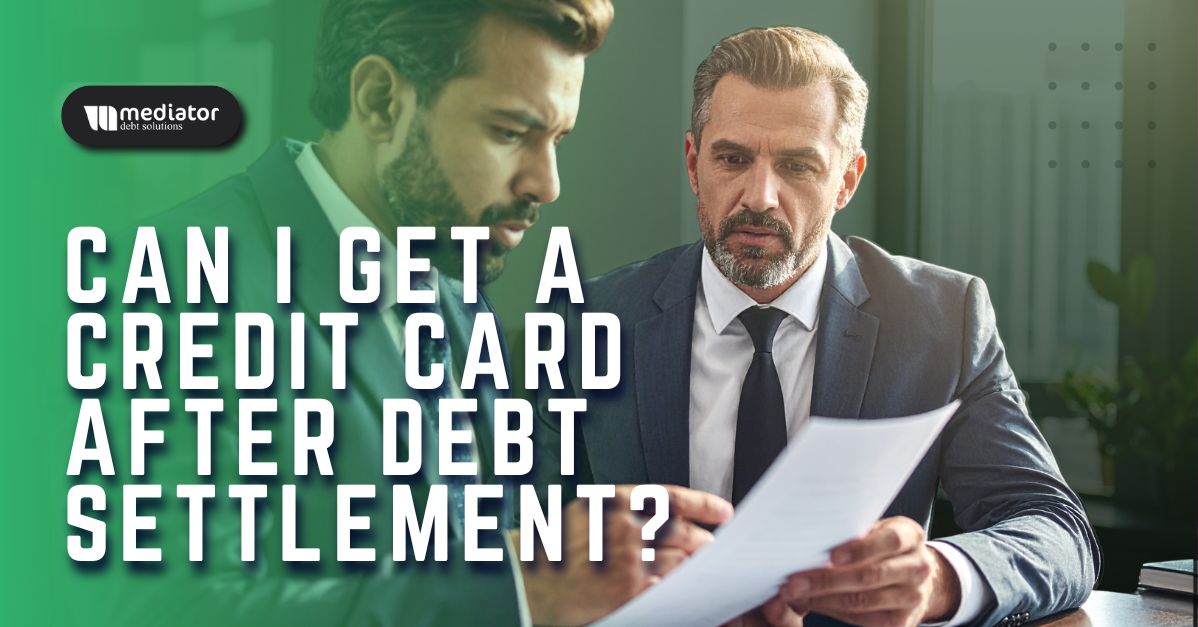 person reviewing credit card options after debt settlement