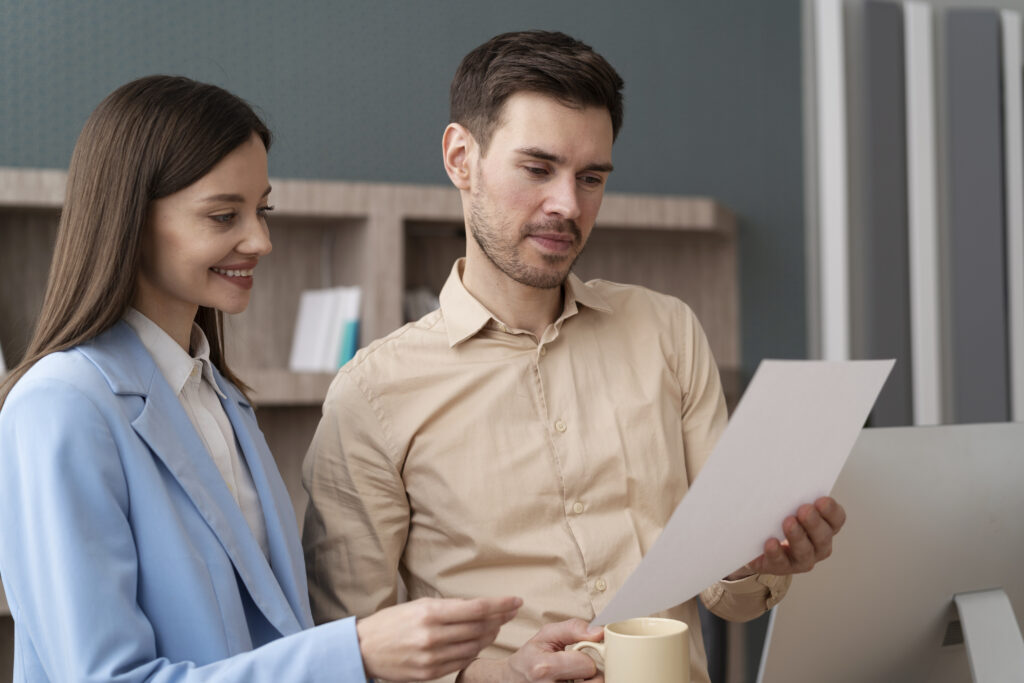 medium shot colleagues working together